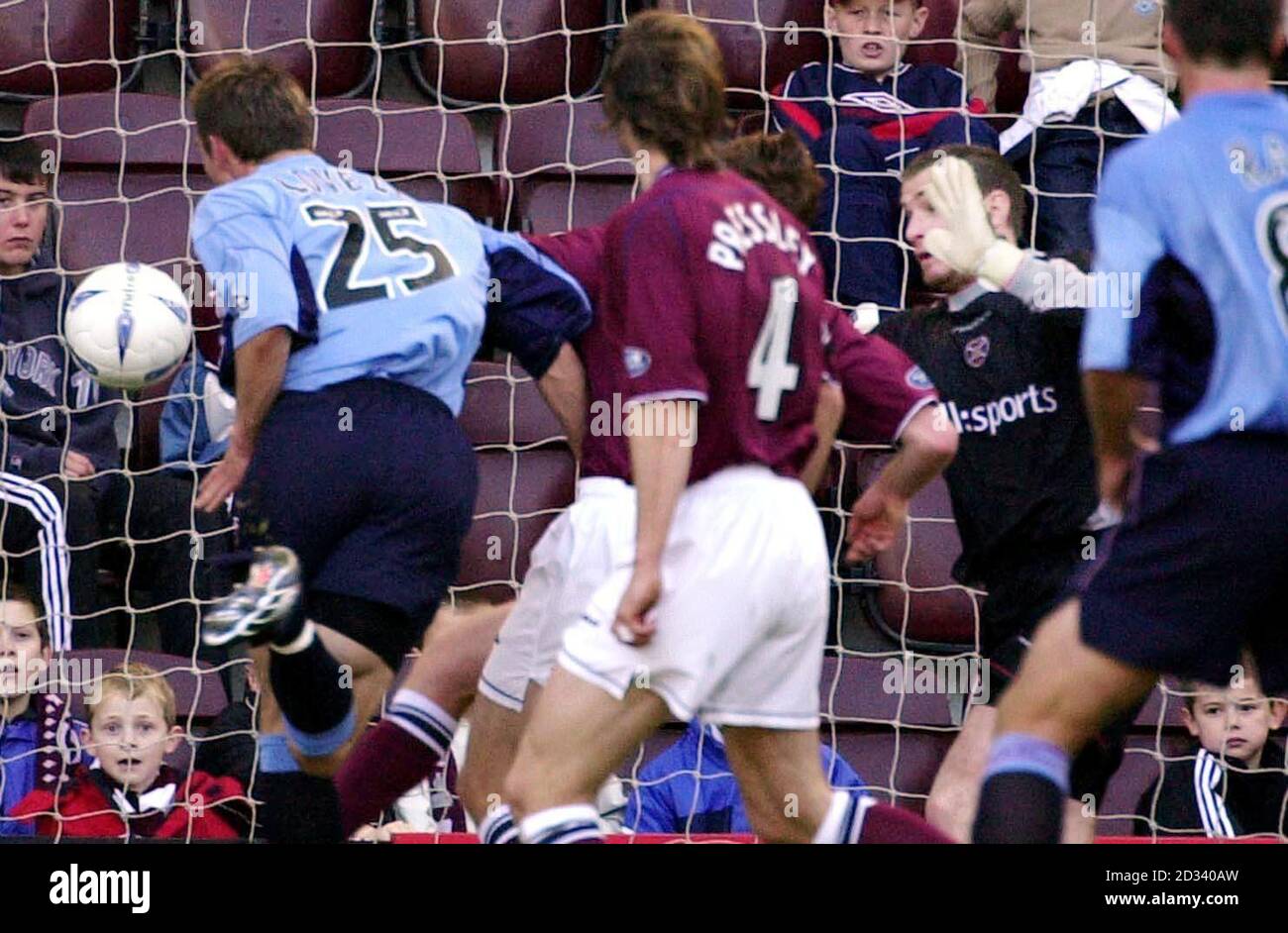 Dundee`s Steven Lovell (left) scores against Hearts during the Bank of Scotland Premiership match at the Tynecastle Stadium.  Stock Photo